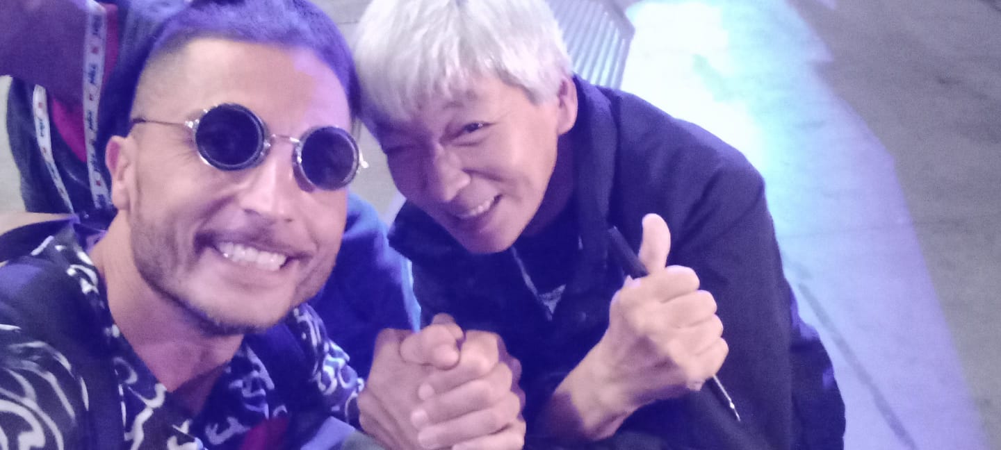 Emanuele Migliorese con un professionista del fumetto e manga